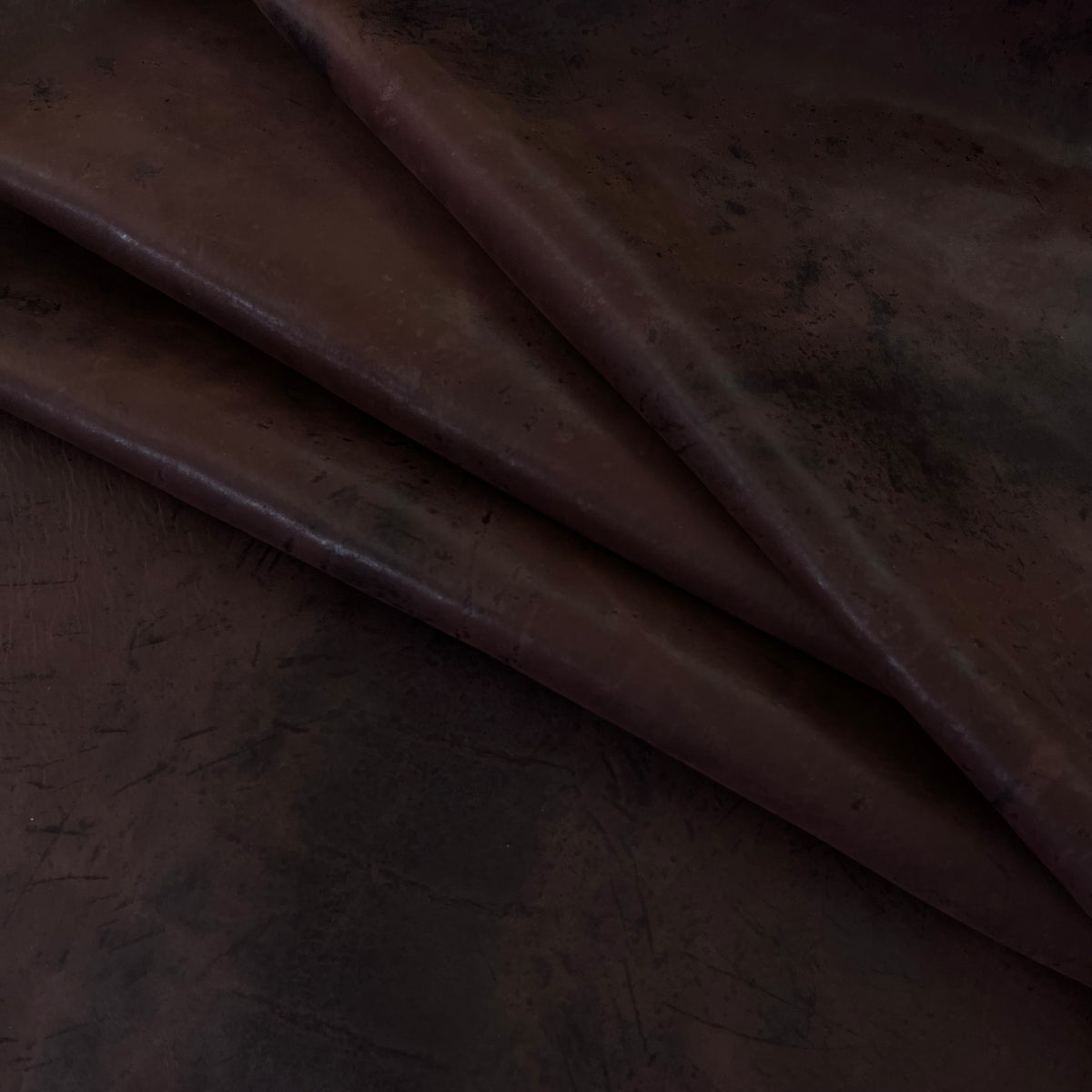 Wild Thing Nubuck Horse Leather in Kakao – rich cocoa brown hide that darkens and softens over time, District Leathers.