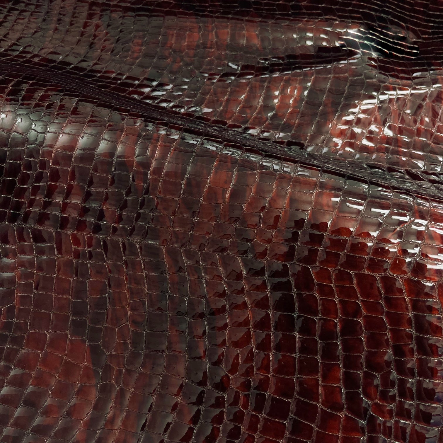 Croc Embossed Patent Cow Hide