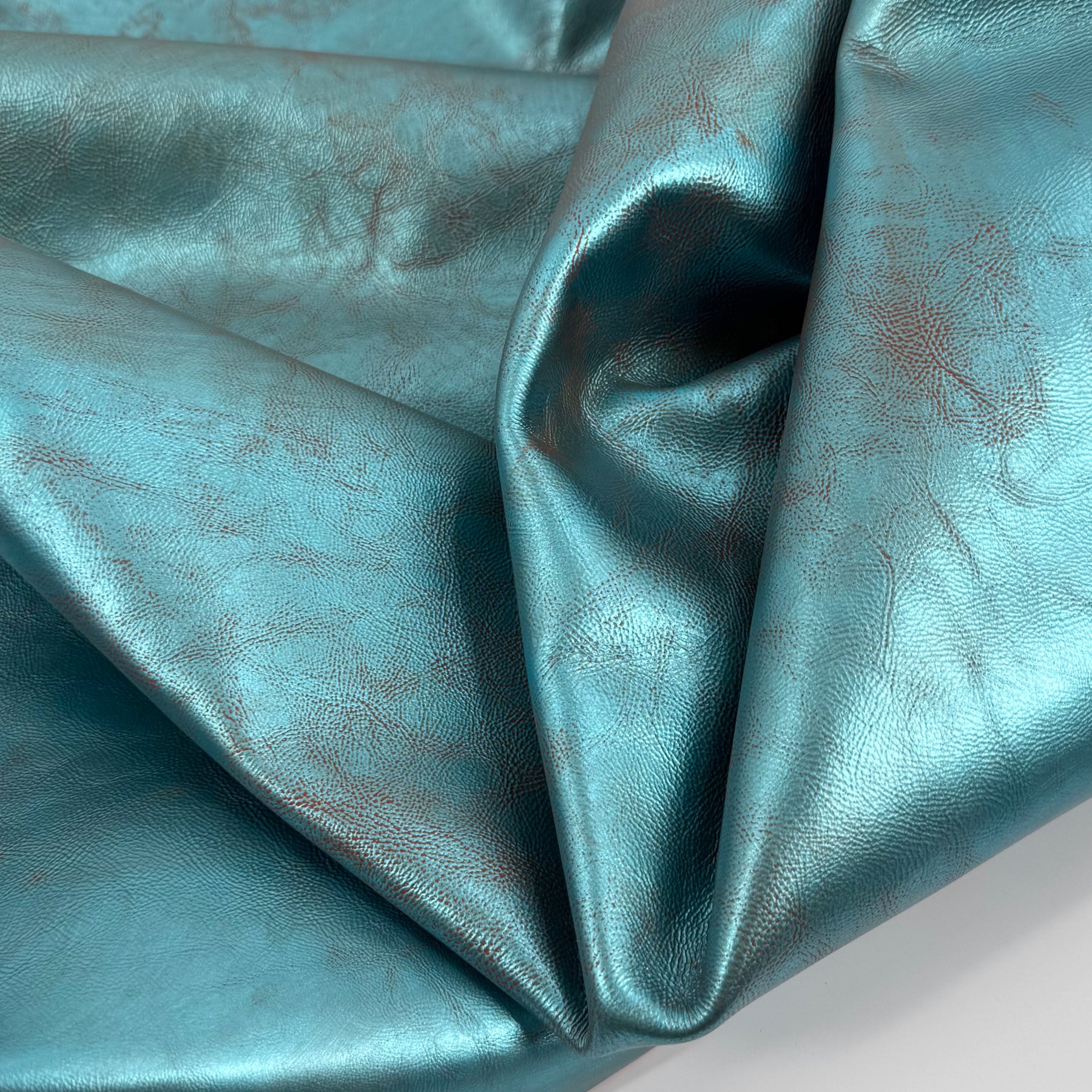 Midas Teal/Rust Distressed Metallic Cow