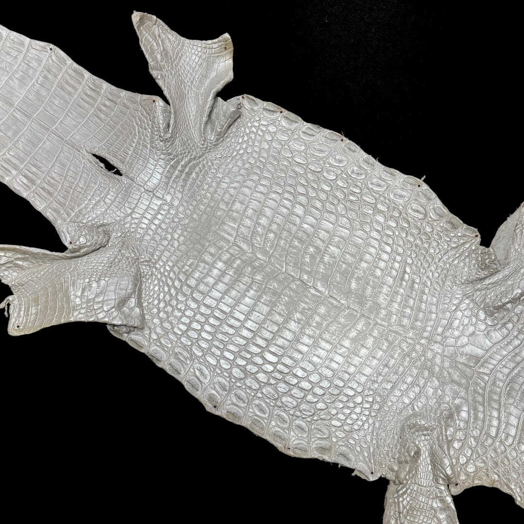 Shimmering pearl-white crocodile leather for bespoke fashion and artisan design – District Leathers.