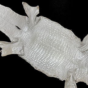 Shimmering pearl-white crocodile leather for bespoke fashion and artisan design – District Leathers.