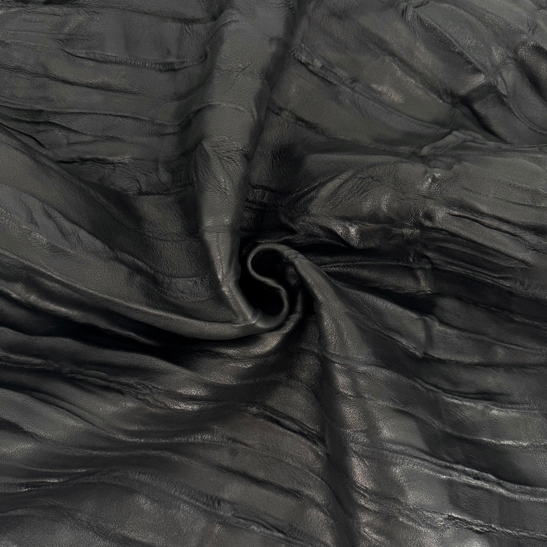 Black Melo Lamb leather hide with soft grain texture, ideal for designers and leather artisans – District Leathers.