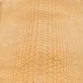 Premium dried peach Nubuck Python skin with a velvety matte finish and natural patterning.