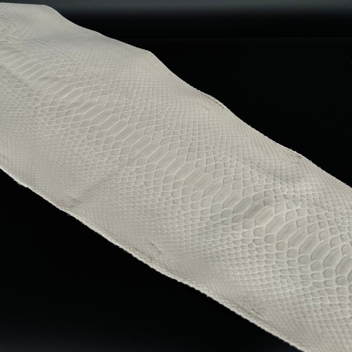 Tortilla-toned nubuck python skin – premium exotic leather with a suede-like finish